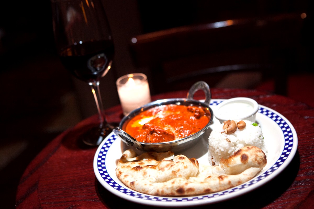 Butter chicken with naan and rice