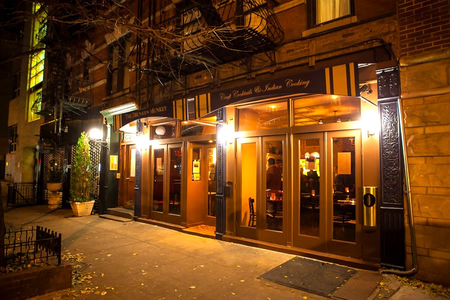 The Drunken Munkey at night, 338 East 92nd Street